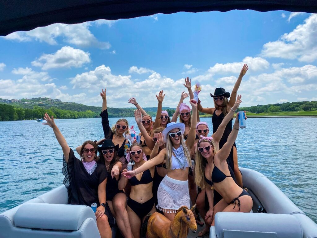  A group of friends partying on a boat.
