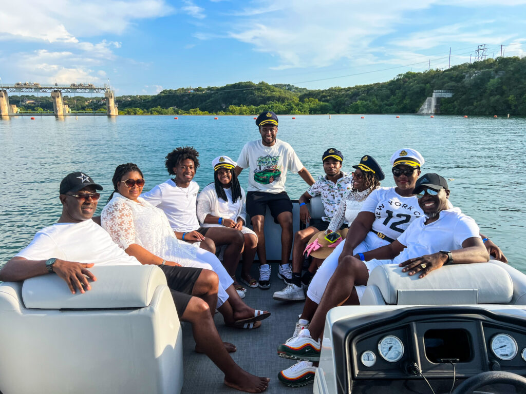 Friends enjoying a boat party on Lake Austin