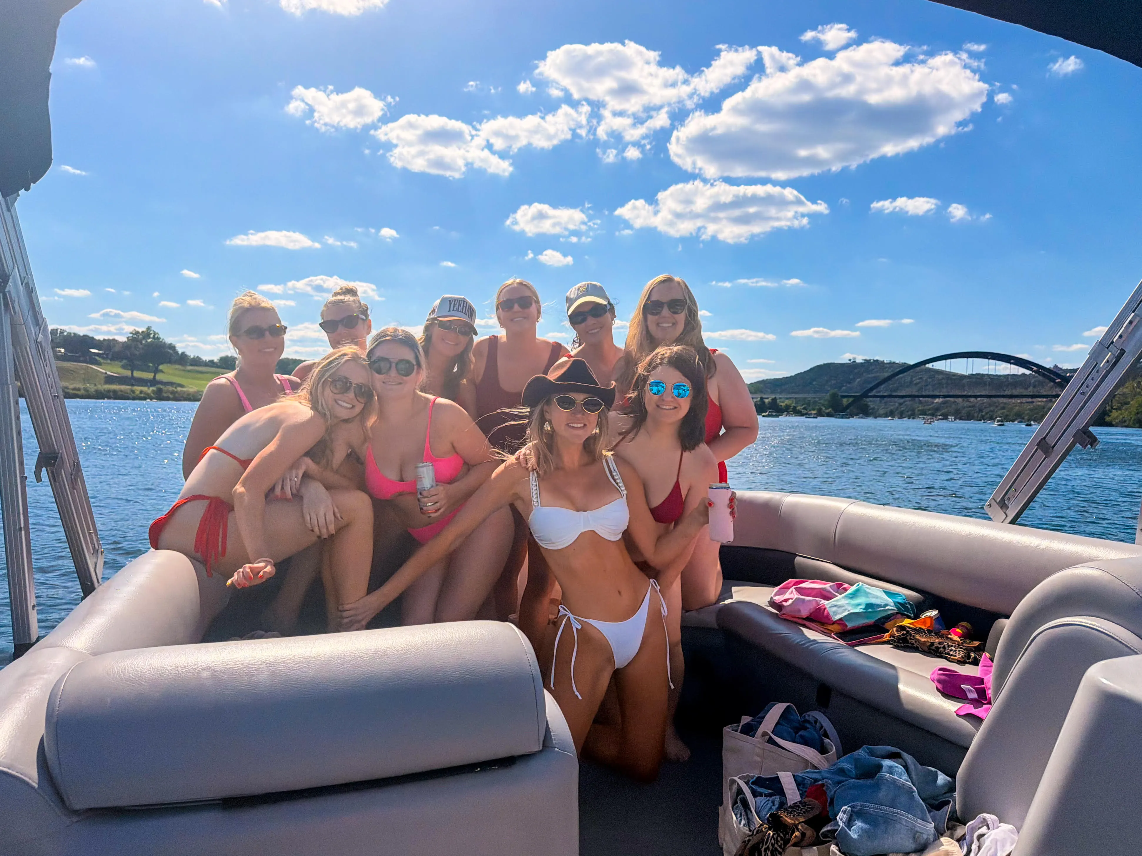 Friends enjoying a Lake Austin bachelorette boat party with Wake Riderz