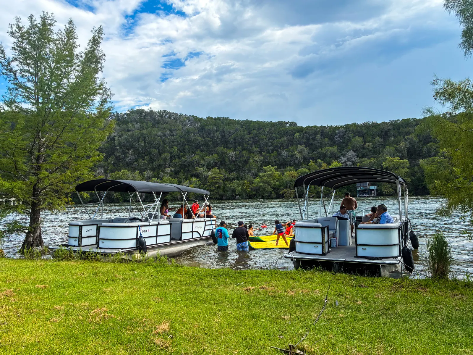 Wake Riderz guests enjoying captained pontoon boat rentals on Lake Austin