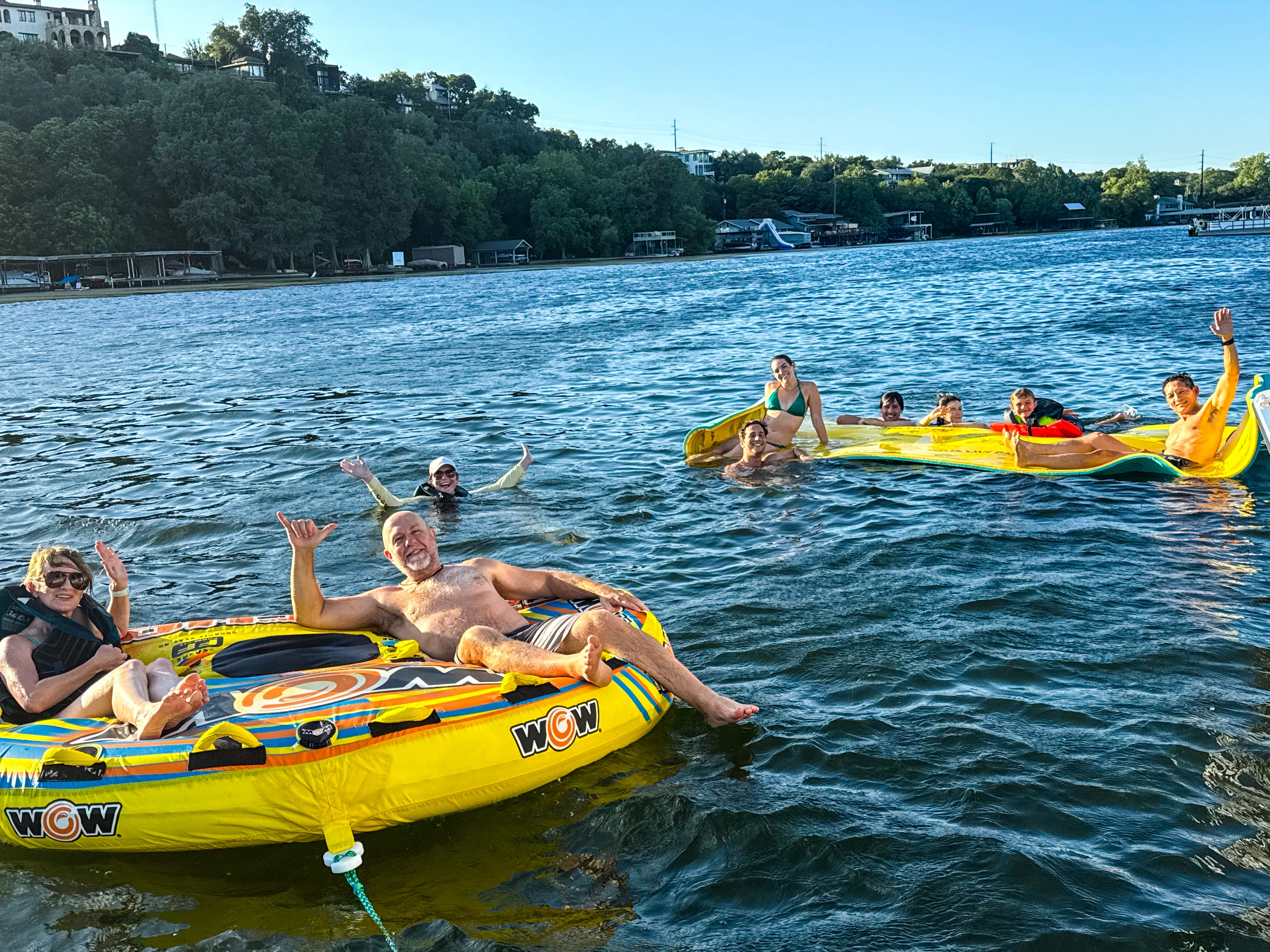 Birthday group celebrating aboard a private Wake Riderz pontoon boat on Lake Austin