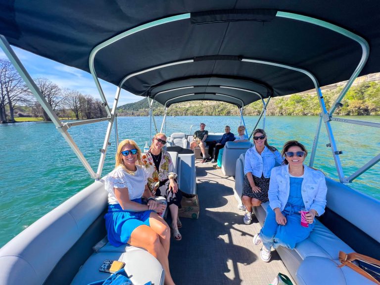 Fully sun shaded, partially guided boat tour on Lake Austin.