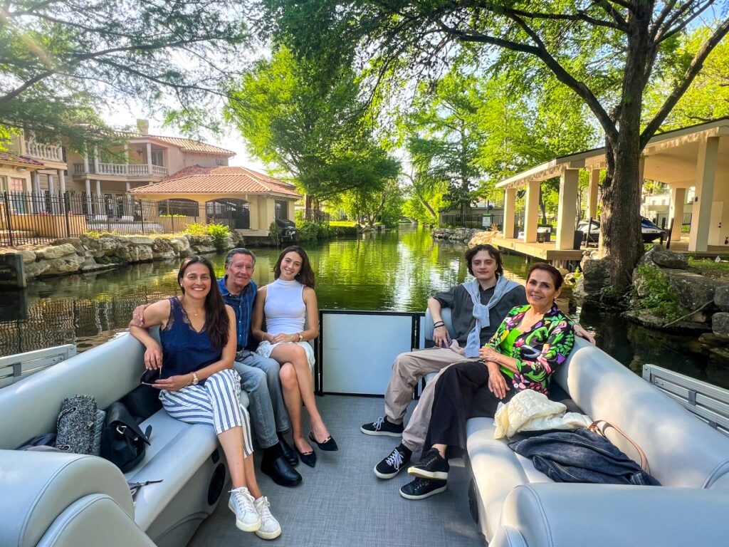 Wake Riderz pontoon boat rental on Lake Austin with happy group